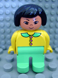 Duplo Figure, Female, Light Green Legs, Yellow Blouse with Light Green Collar and Dark Pink Buttons, Black Hair, Grin