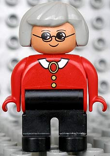 Duplo Figure, Female, Black Legs, Red Blouse with White Collar, Gray Hair, Glasses (75467)