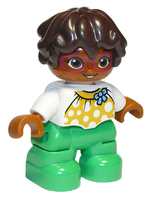 Duplo Figure Lego Ville, Child Girl, Bright Green Legs, White Top with Yellow Pattern and Blue Bow, Dark Brown Wavy Hair, Magenta Glasses (6295446)