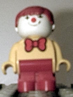 Duplo Figure, Child Type 1 Boy, Red Legs, Yellow Top With Red Bow Tie, Red Hair (Clown)