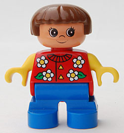 Duplo Figure, Child Type 2 Girl, Blue Legs, Red Torso With Flowers Pattern, Collar And 2 Buttons, Yellow Arms, Brown Hair